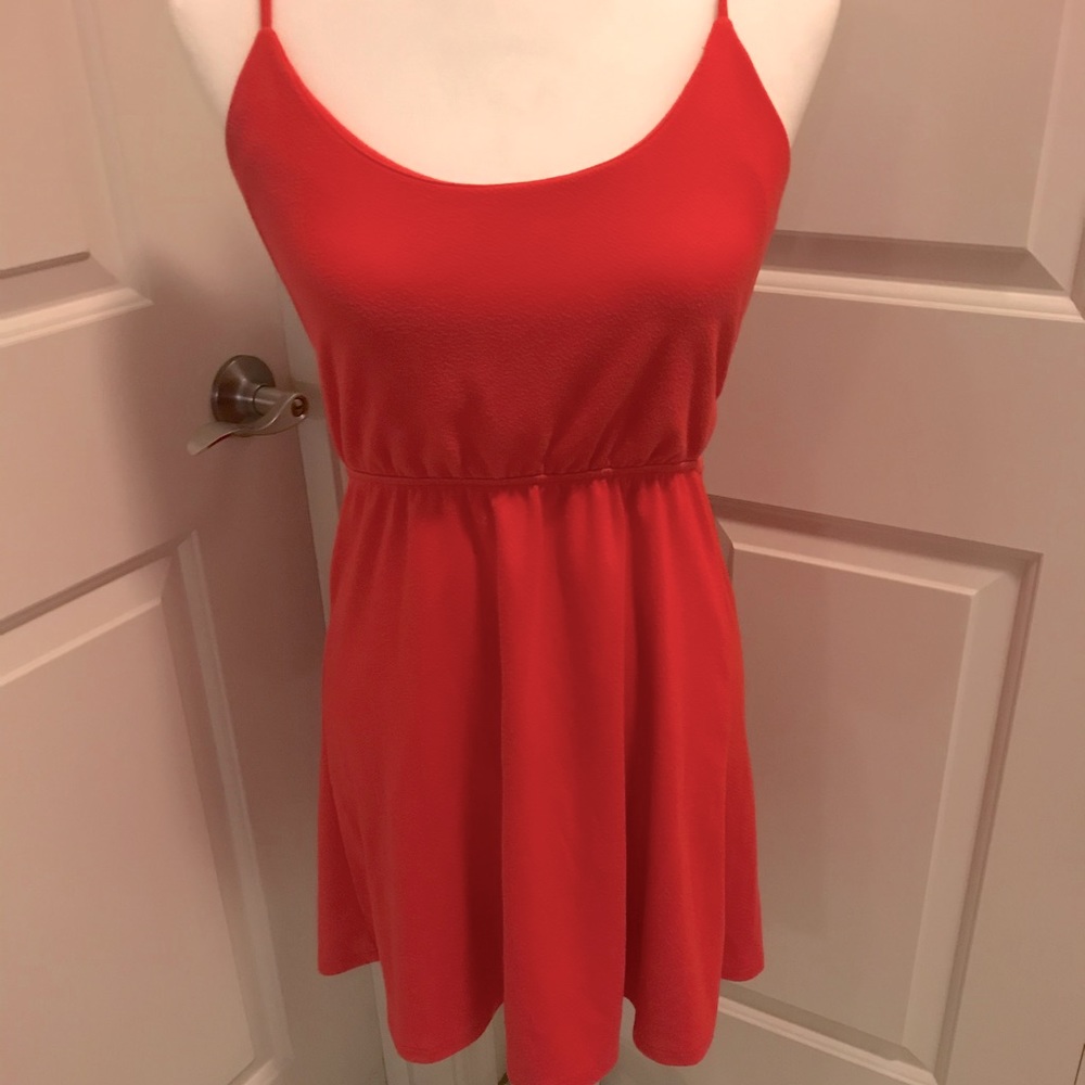 Lady’s orange summer dress.